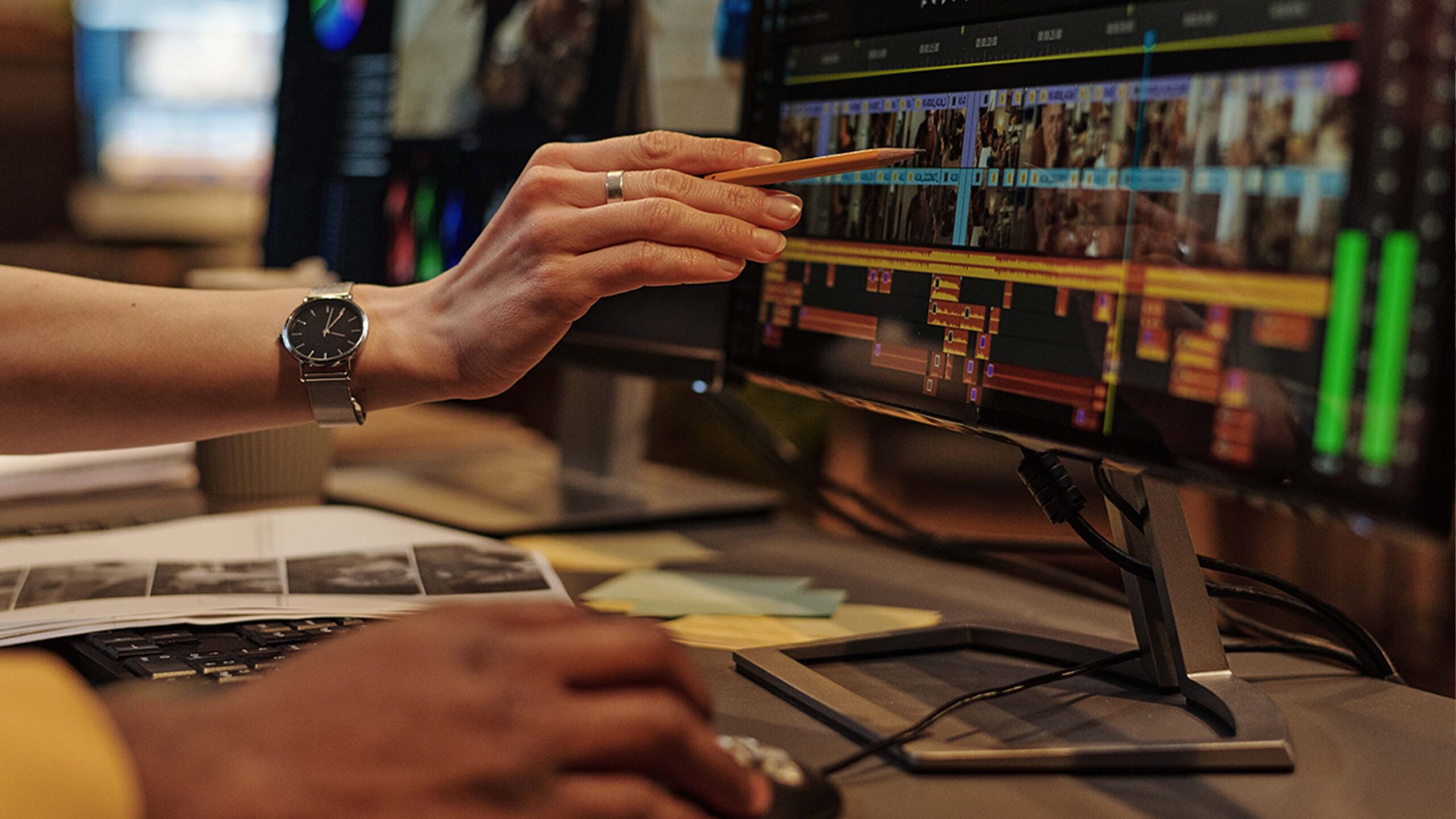 Post-production editing timeline with video, sound and color grading workflow