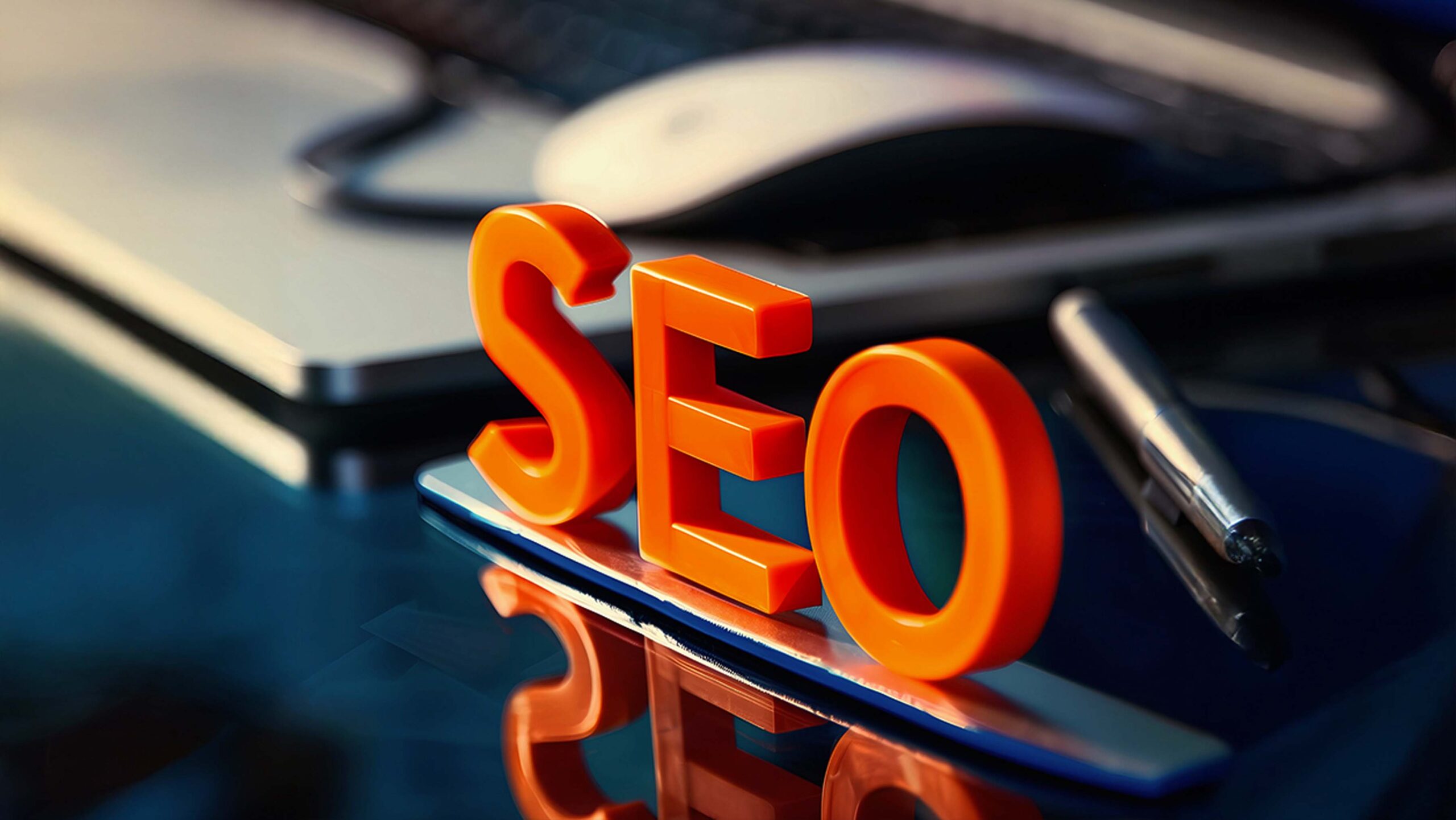 Search engine optimization service with SEO lettering on digital workspace