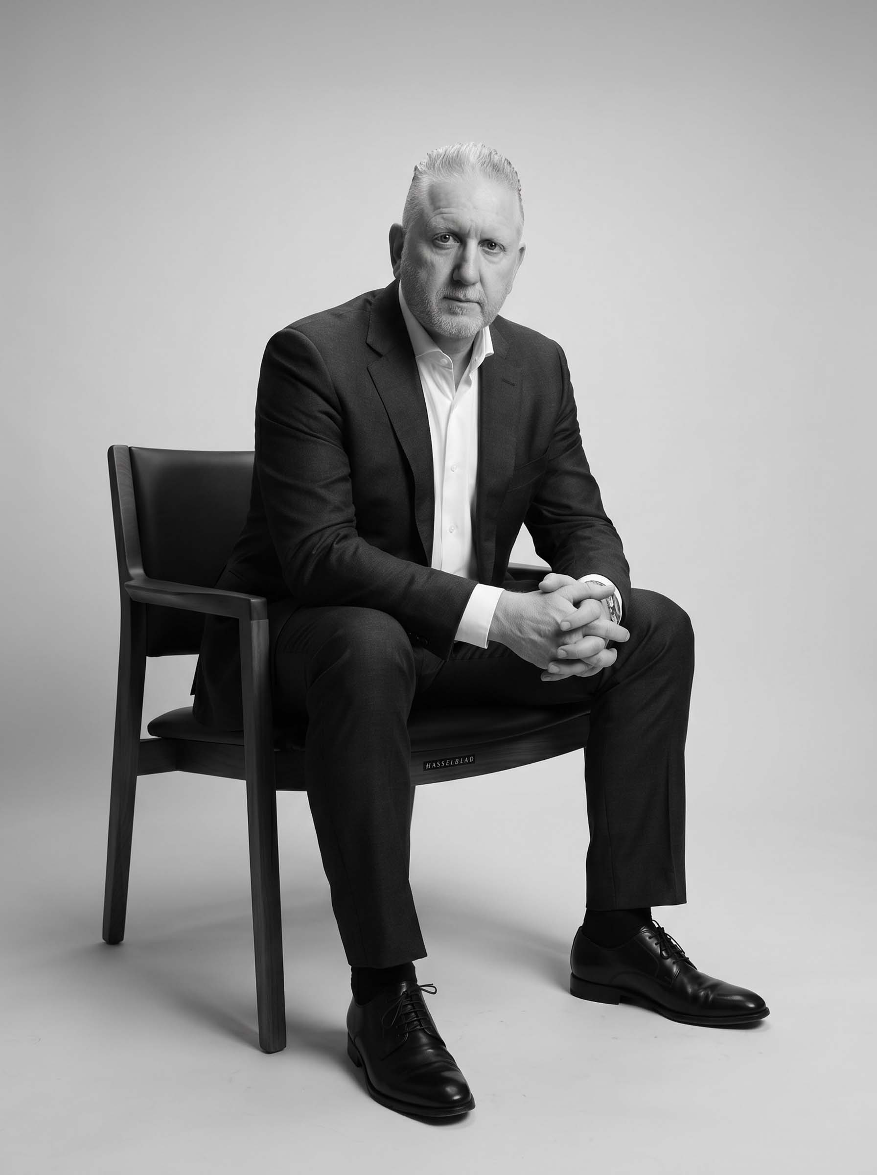 Joe Rabah, CEO at CREA8 sitting wide shot